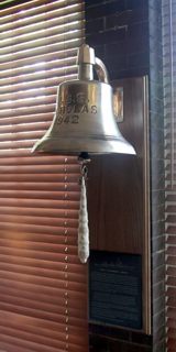 Nicholas's ship's bell and plaque at Center House, Marine Barracks Washington